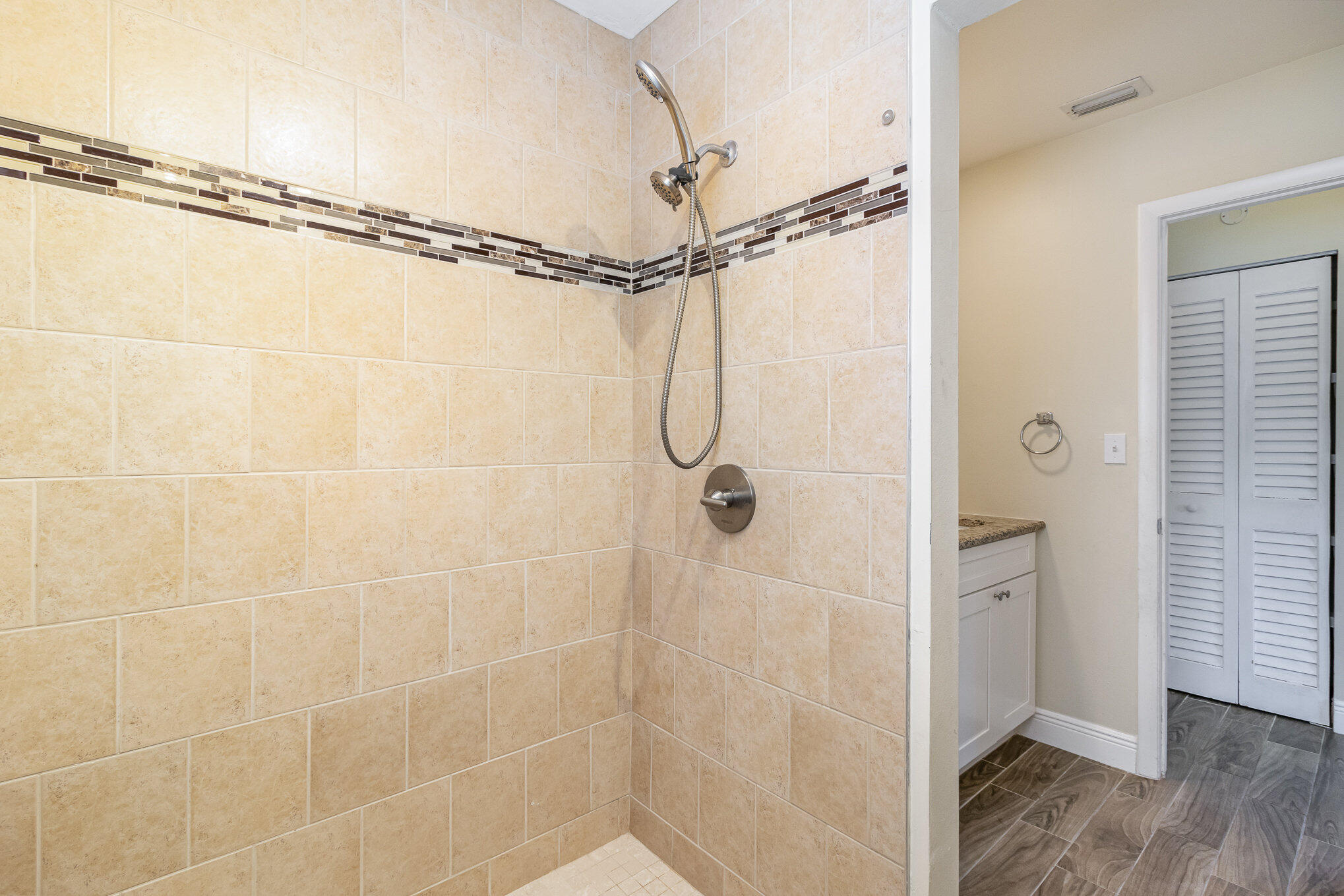 1294 Cimarron Circle Northeast Palm Bay, FL 32905 - Photo 34 of 45 a bathroom that has a shower