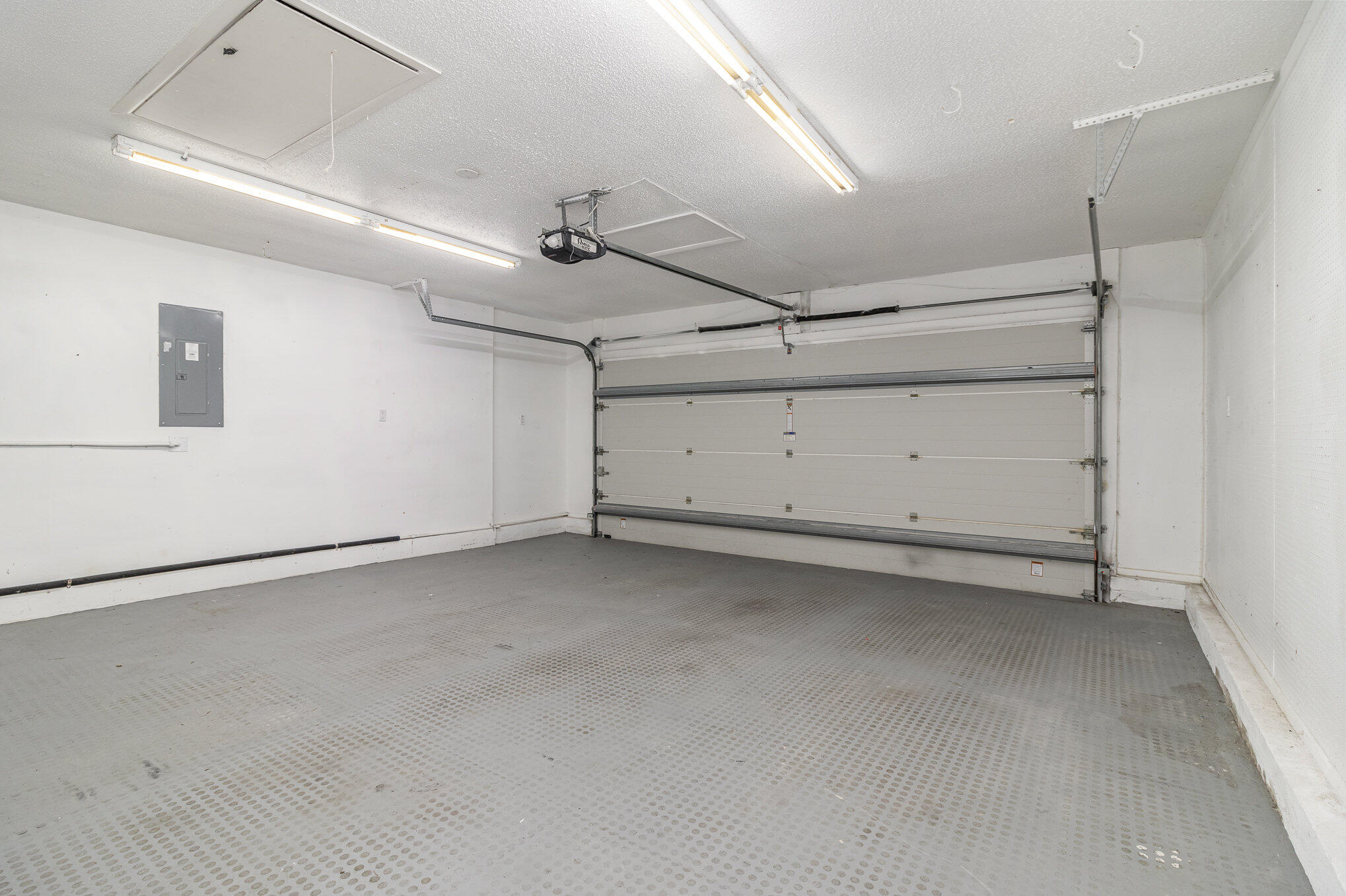 1294 Cimarron Circle Northeast Palm Bay, FL 32905 - Photo 39 of 45 a view of a garage