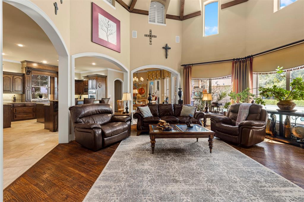 801 White Buffalo Lane Heath, TX 75032 - Photo 11 of 39 a living room with furniture and a large window