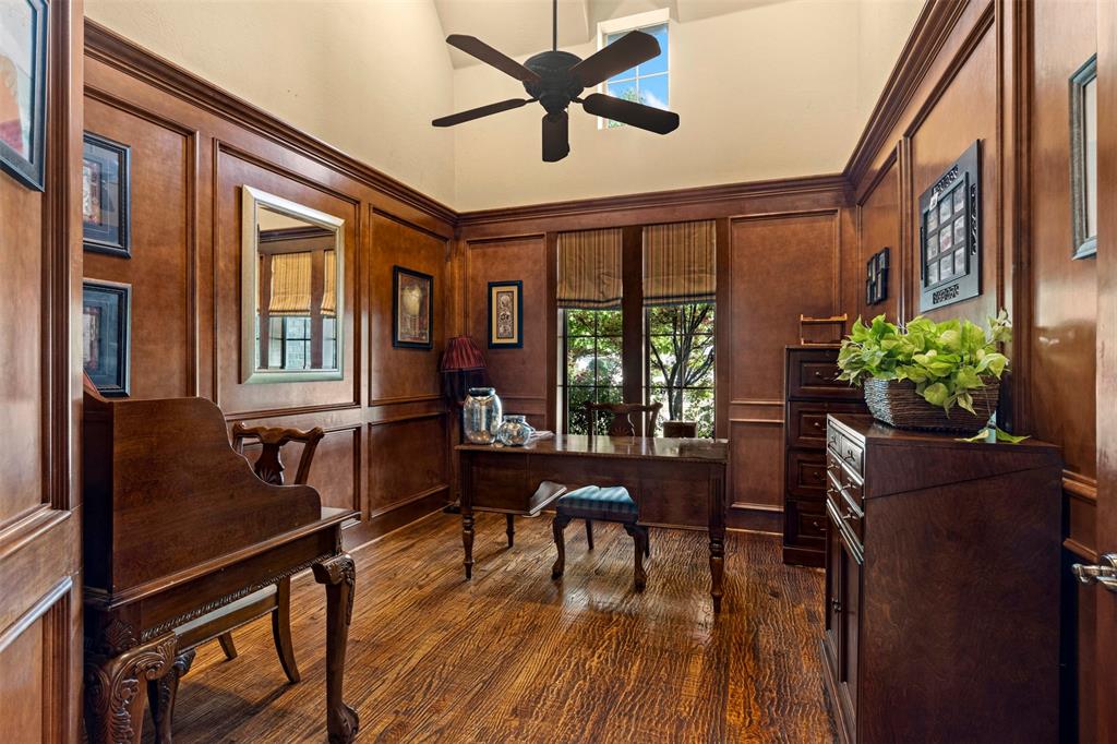 801 White Buffalo Lane Heath, TX 75032 - Photo 10 of 39 a workspace with furniture and a potted plant