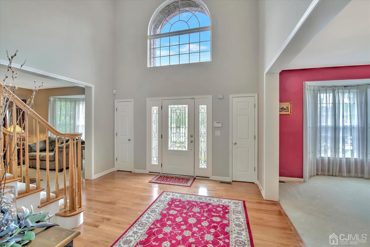 32 Spruce Meadows Drive Monroe Township, NJ 08831 - Photo 3 of 46 a bedroom with furniture and a window