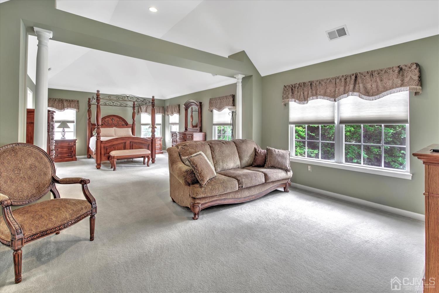 32 Spruce Meadows Drive Monroe Township, NJ 08831 - Photo 22 of 46 a living room with furniture and a large window