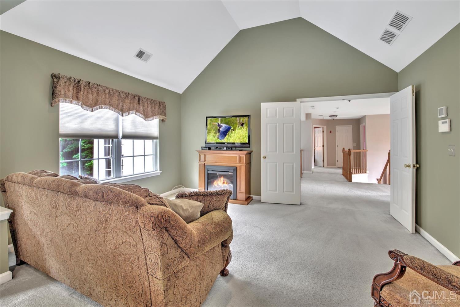 32 Spruce Meadows Drive Monroe Township, NJ 08831 - Photo 24 of 46 a living room with furniture and windows