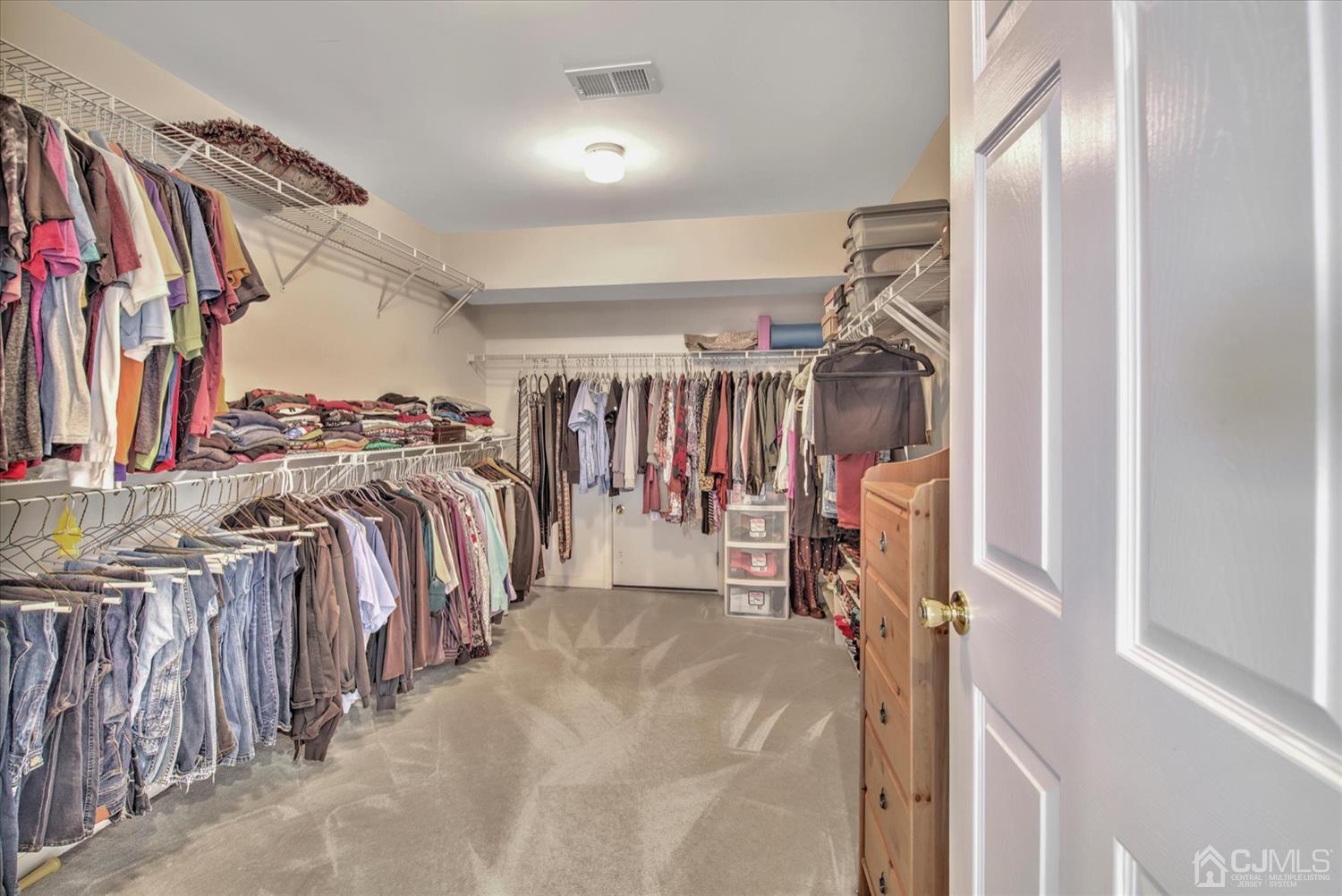 32 Spruce Meadows Drive Monroe Township, NJ 08831 - Photo 29 of 46 a view of walk in closet with clothes