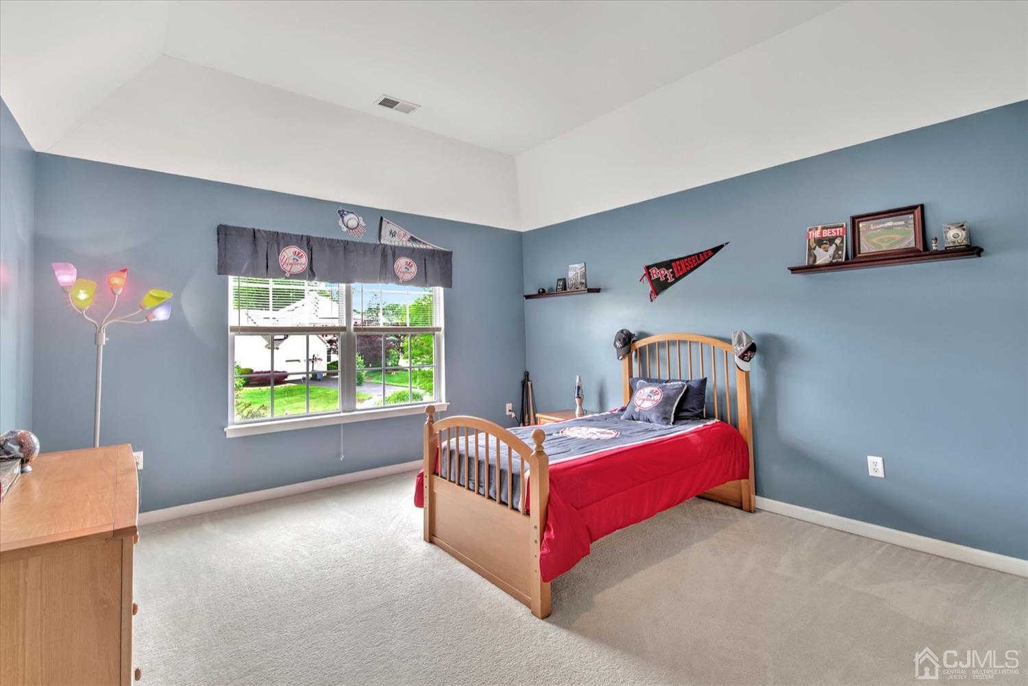 32 Spruce Meadows Drive Monroe Township, NJ 08831 - Photo 30 of 46 a bedroom with bed and a window