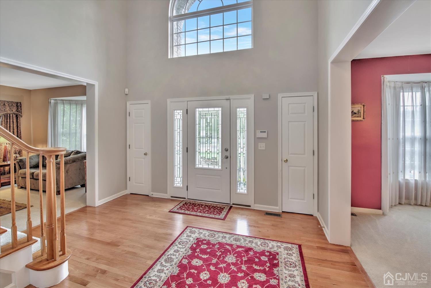 32 Spruce Meadows Drive Monroe Township, NJ 08831 - Photo 4 of 46 a bedroom with furniture and a rug