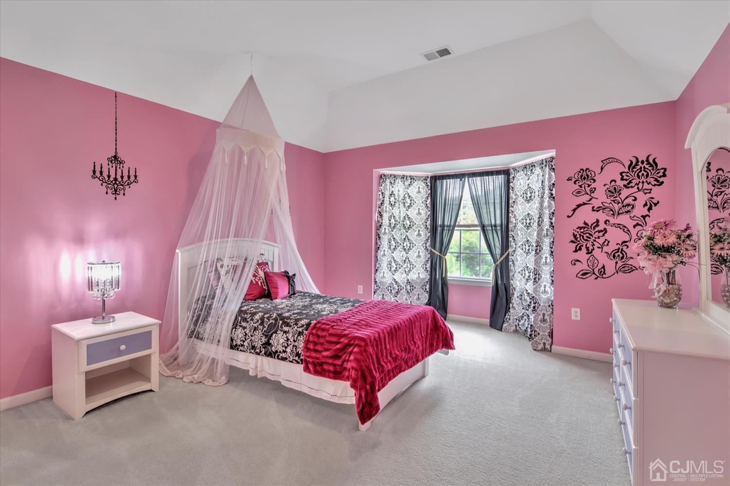 32 Spruce Meadows Drive Monroe Township, NJ 08831 - Photo 32 of 46 a bedroom with a bed and a mirror