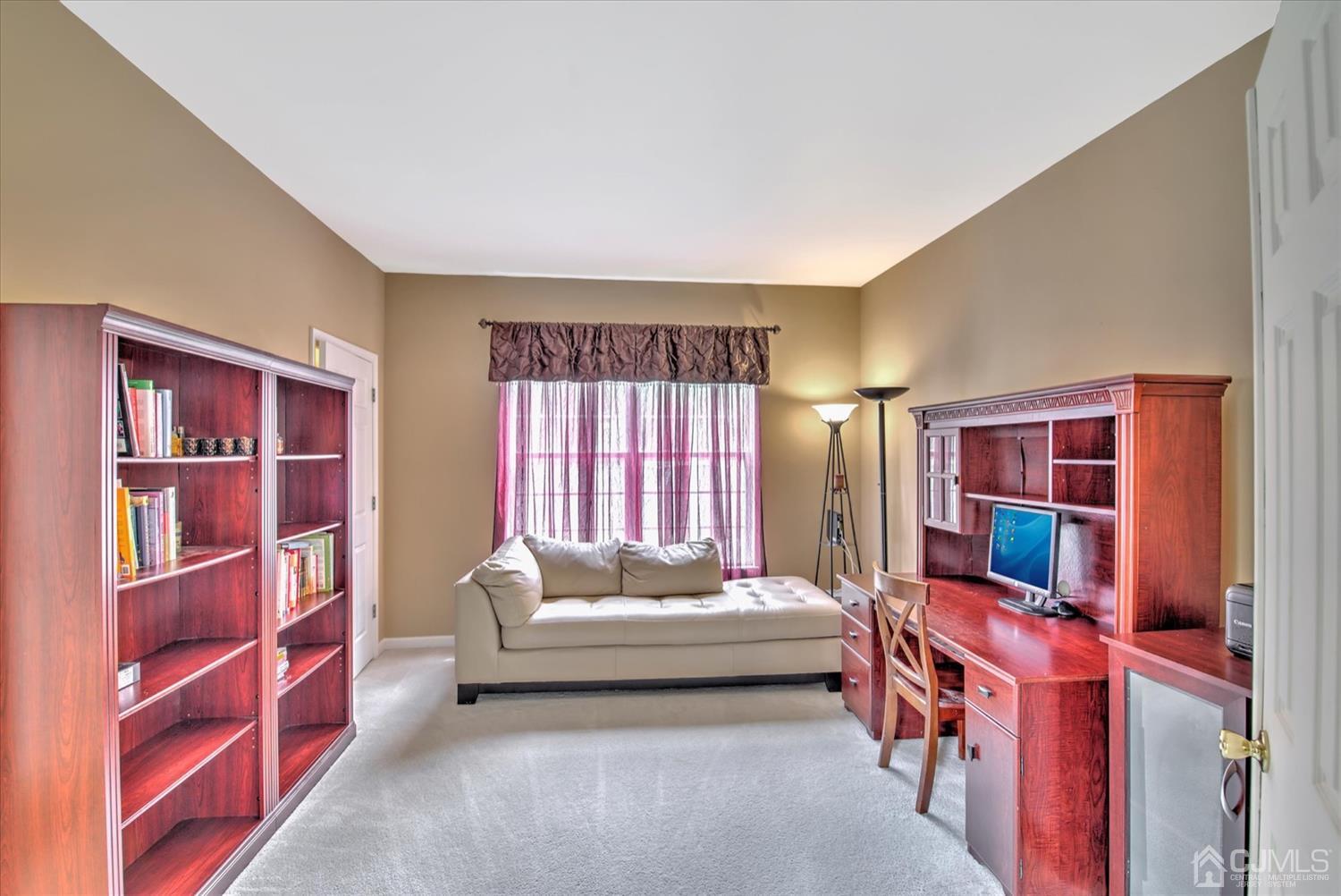 32 Spruce Meadows Drive Monroe Township, NJ 08831 - Photo 5 of 46 a bedroom with furniture and a bathtub
