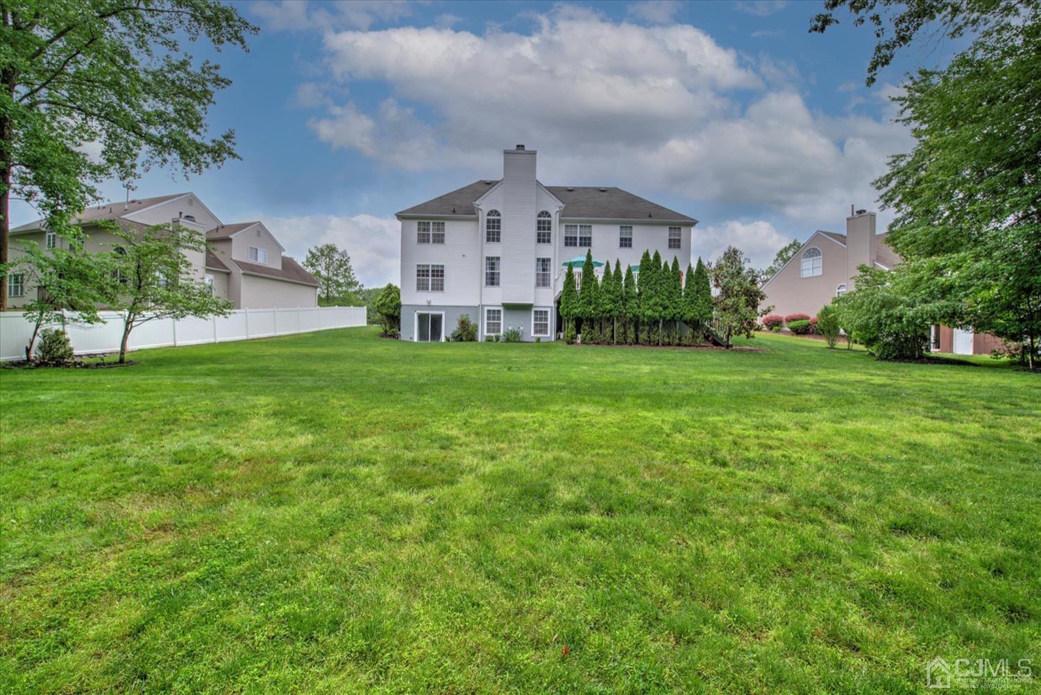 32 Spruce Meadows Drive Monroe Township, NJ 08831 - Photo 46 of 46 a front view of a house with garden
