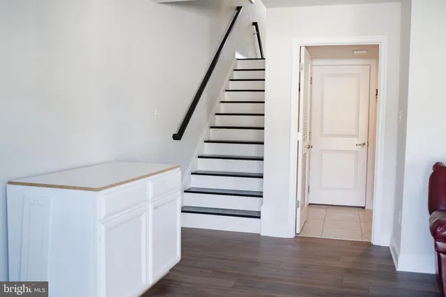 a large white bed in a white room