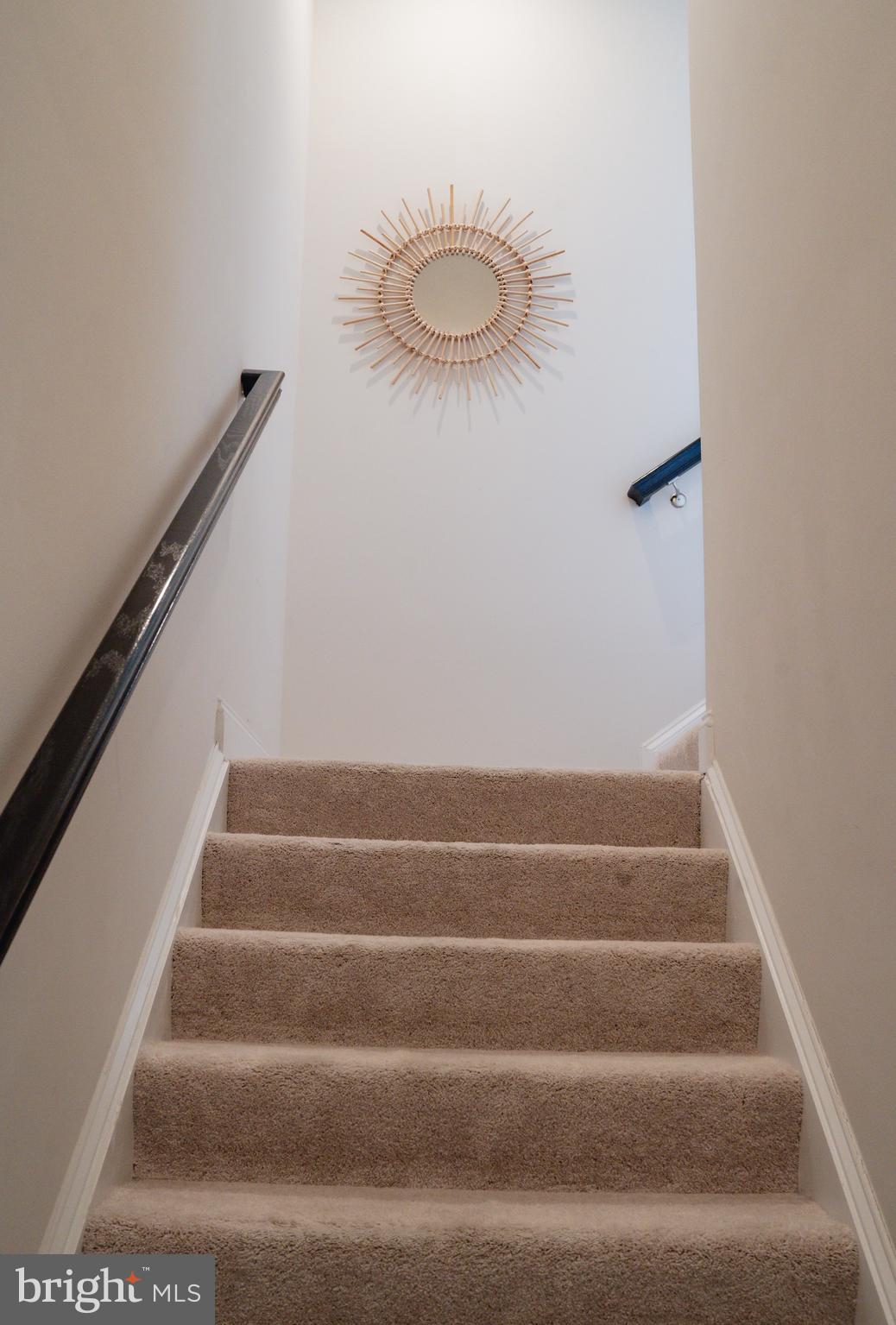 36046 Auburn Way Millsboro, DE 19966 - Photo 29 of 56 a view of staircase with white walls