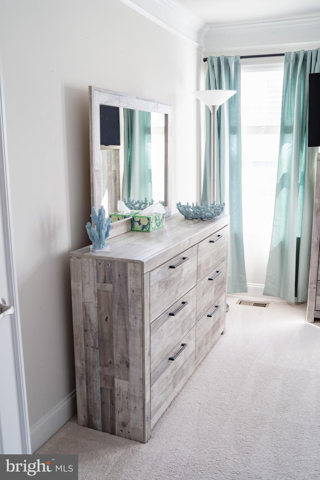 36046 Auburn Way Millsboro, DE 19966 - Photo 32 of 56 a bathroom with a granite countertop sink and a mirror