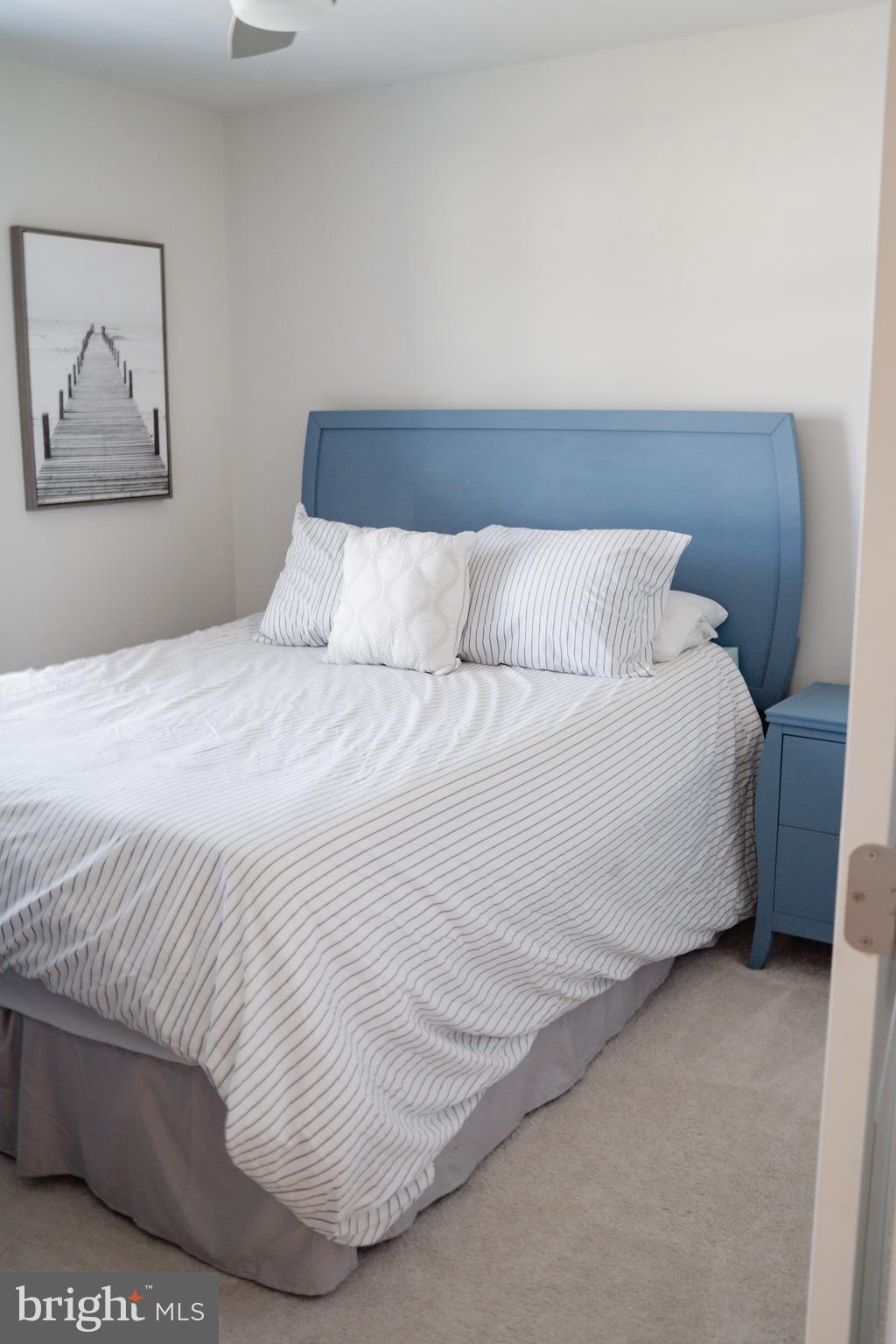 36046 Auburn Way Millsboro, DE 19966 - Photo 38 of 56 a large white bed in a white room