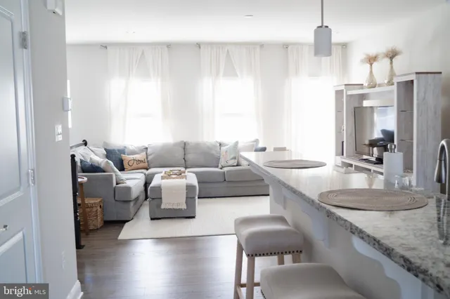 a living room with a couch and a table