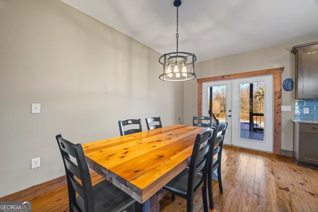 a stove top oven sitting inside of a kitchen