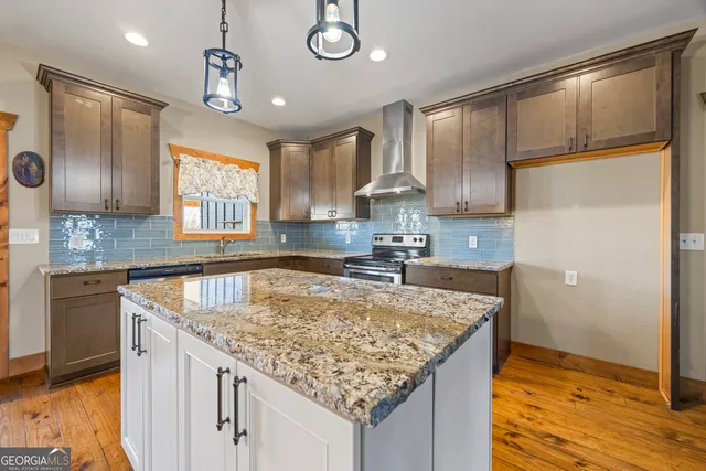 a bathroom with a bathtub and a sink