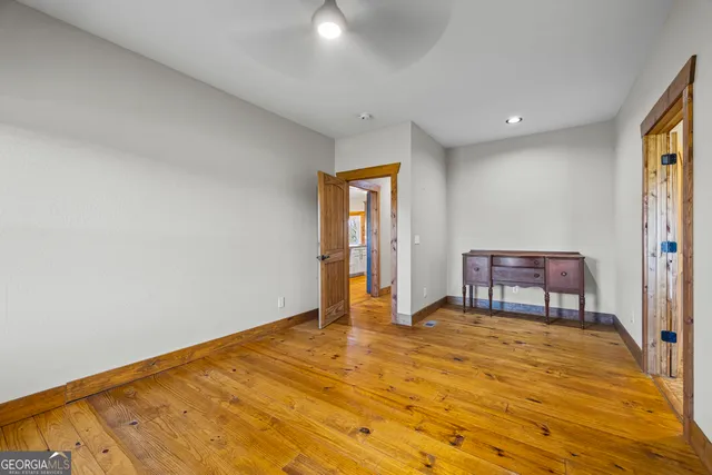 a view of a house with swimming pool yard and furniture