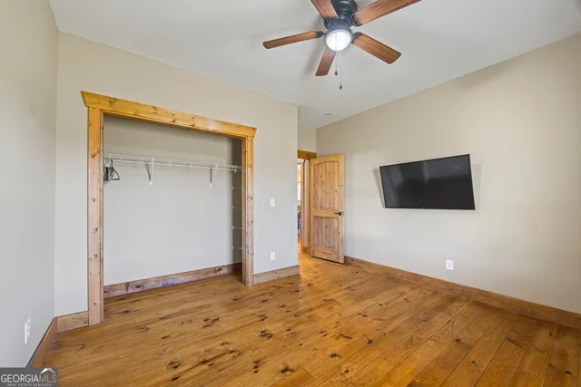 a view of a room with racks on the wall