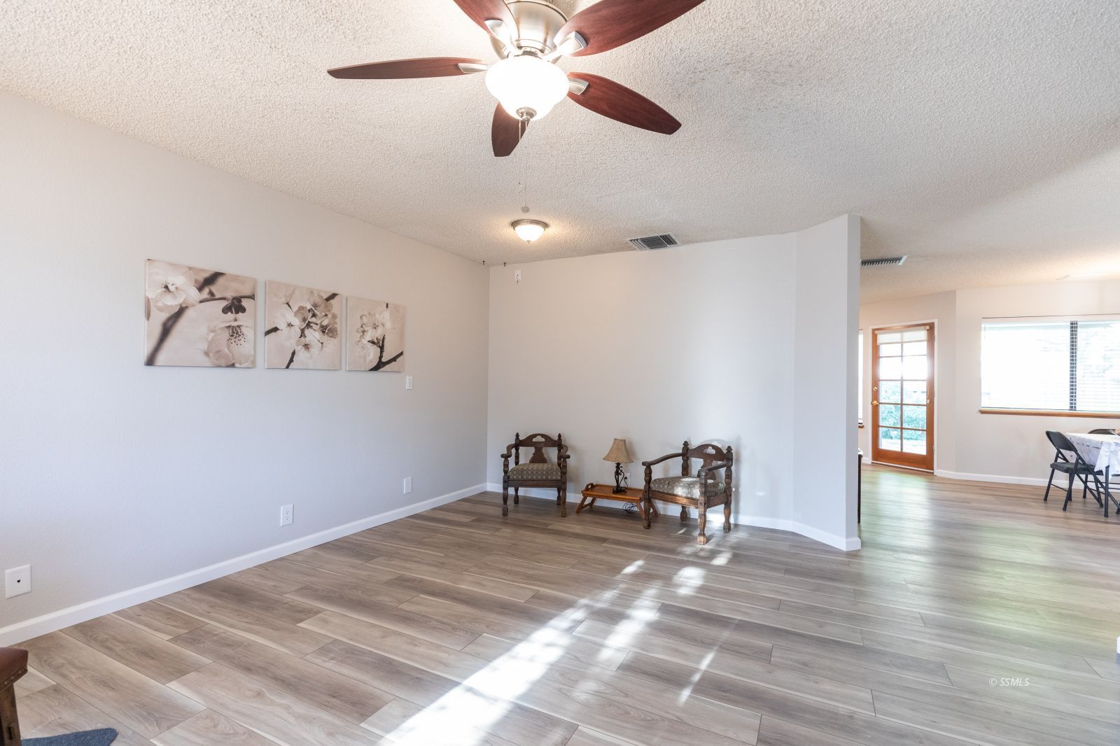 616 Yellow Astor Avenue Ridgecrest, CA 93555 - Photo 8 of 29 a view of a room with furniture and chandelier fan