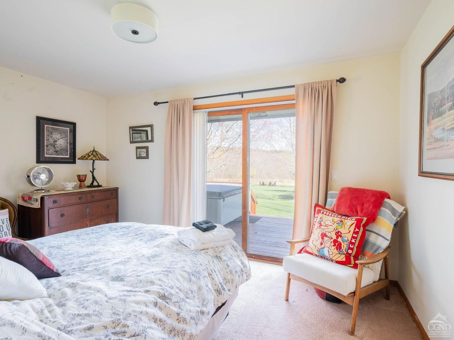 266 Siam Road Windham, NY 12496 - Photo 15 of 52 a bedroom with a bed and a couch