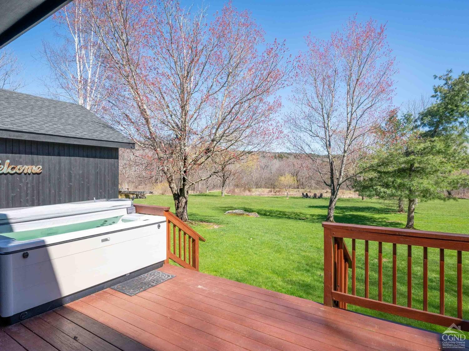266 Siam Road Windham, NY 12496 - Photo 31 of 52 a view of a backyard with a garden and tree