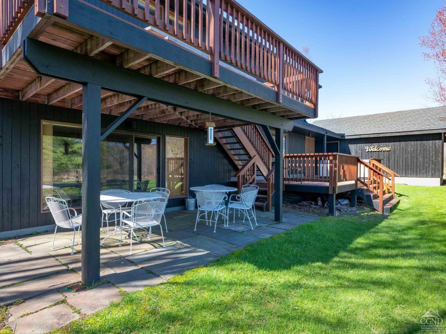 266 Siam Road Windham, NY 12496 - Photo 35 of 52 a view of a backyard with a patio and a patio