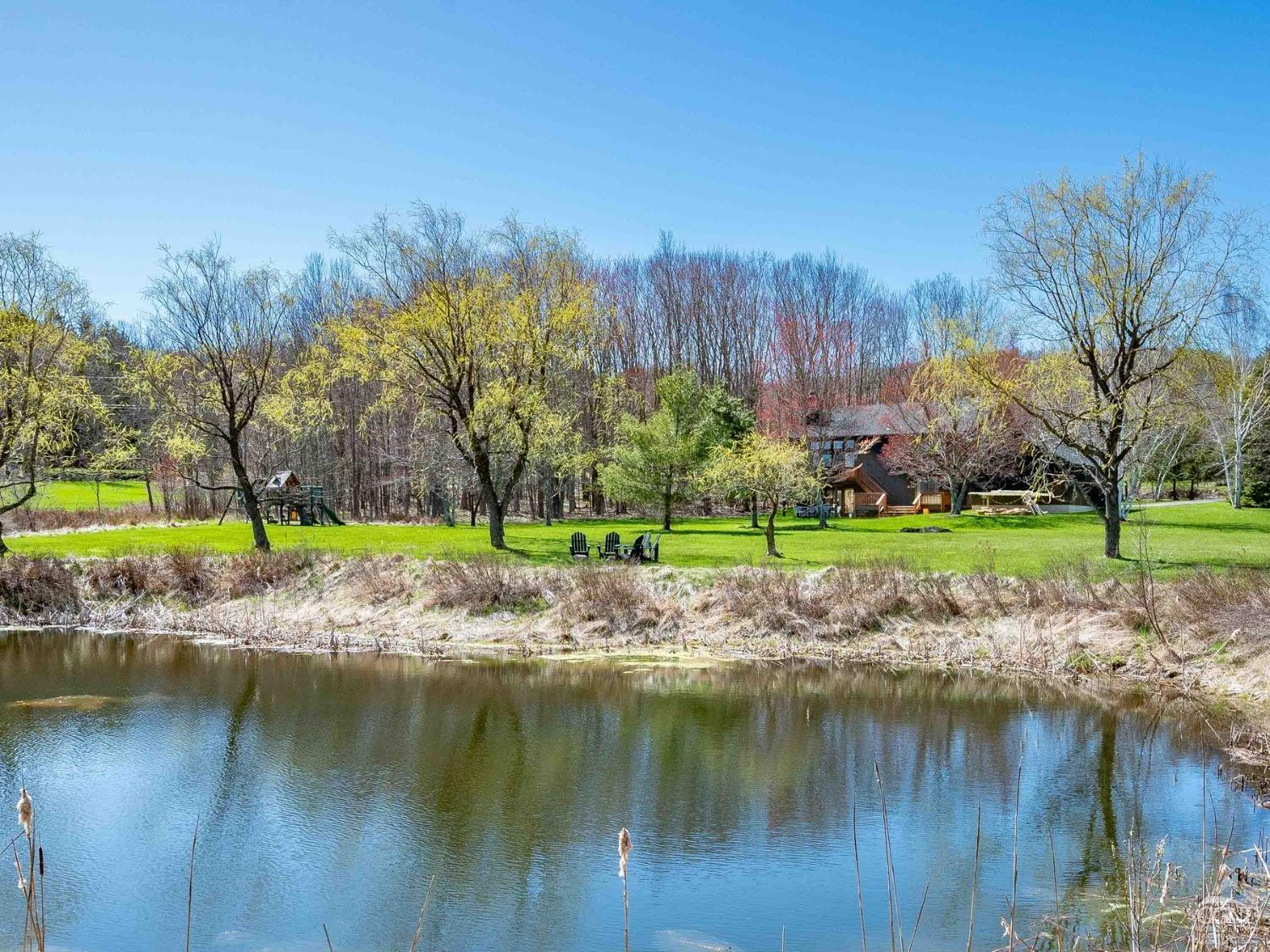 266 Siam Road Windham, NY 12496 - Photo 37 of 52 a view of an ocean with a building in the background