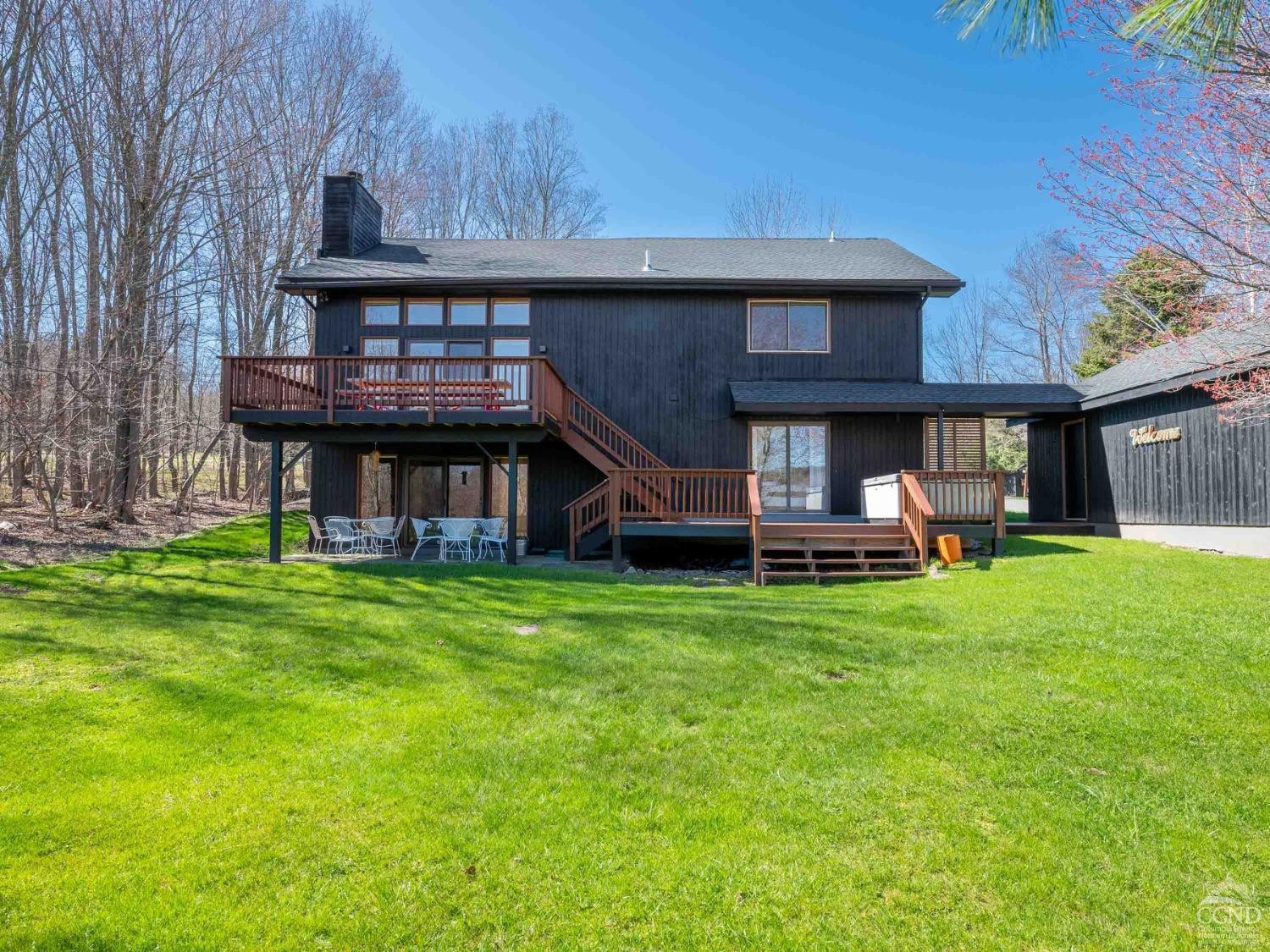 266 Siam Road Windham, NY 12496 - Photo 41 of 52 a view of an house with backyard space and balcony