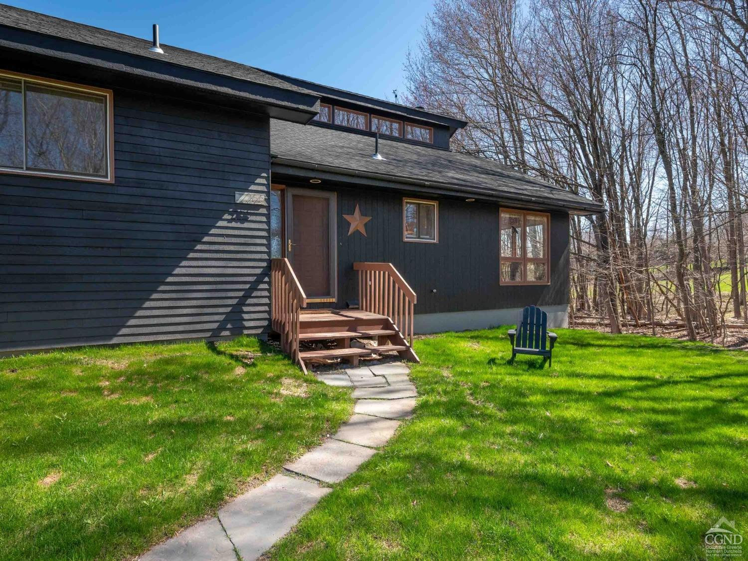 266 Siam Road Windham, NY 12496 - Photo 42 of 52 a front view of a house with garden