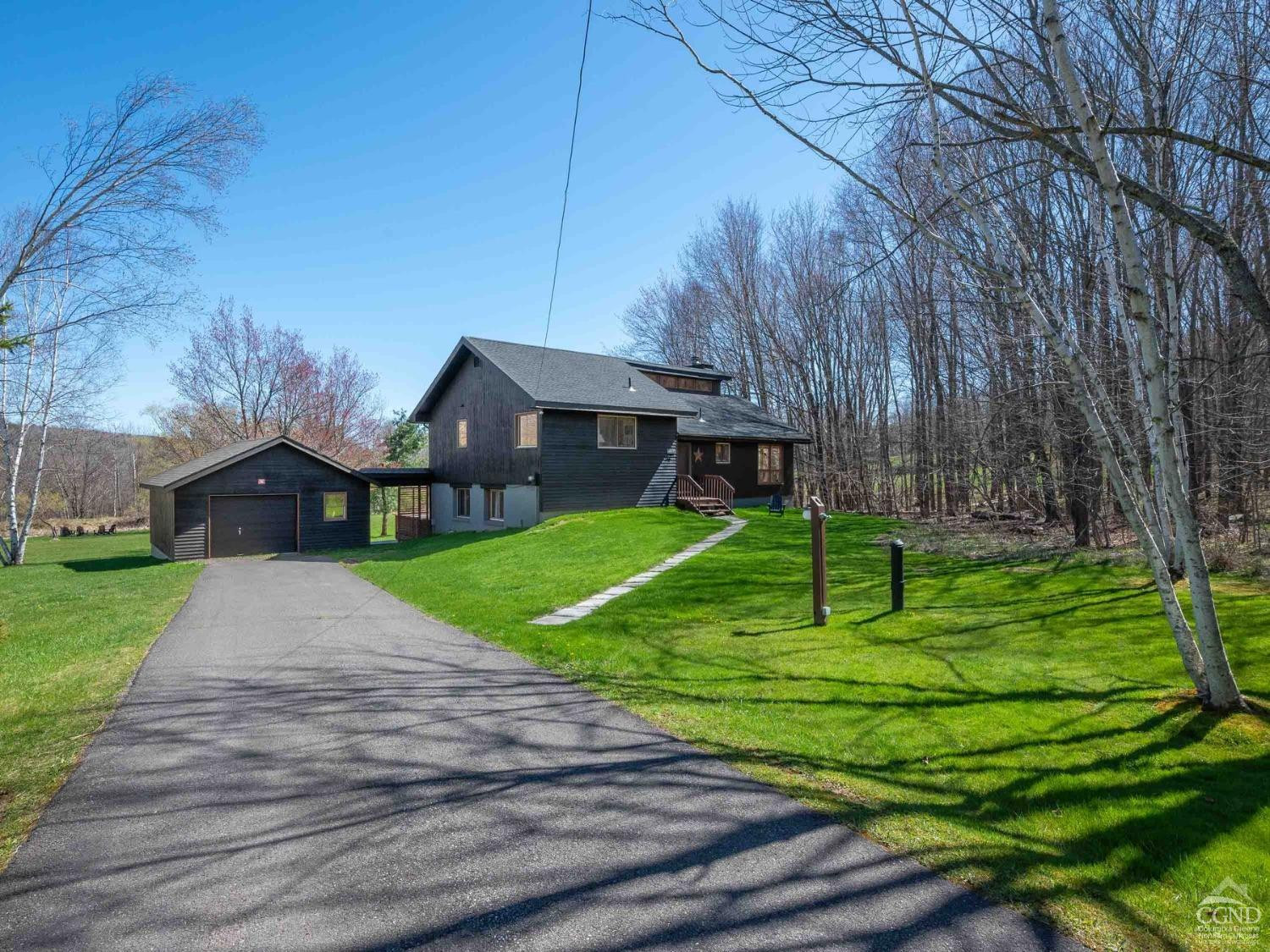 266 Siam Road Windham, NY 12496 - Photo 45 of 52 a view of a house with a yard