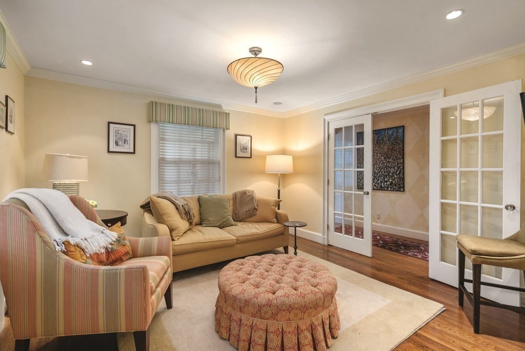 131 Oliver Road Newton, MA 02468 - Photo 13 of 41 a living room with furniture and a window