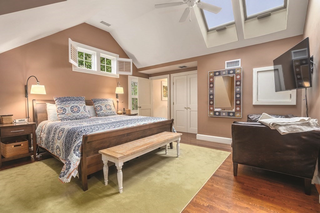 131 Oliver Road Newton, MA 02468 - Photo 21 of 41 a bedroom with a bed couch and a view of bedroom