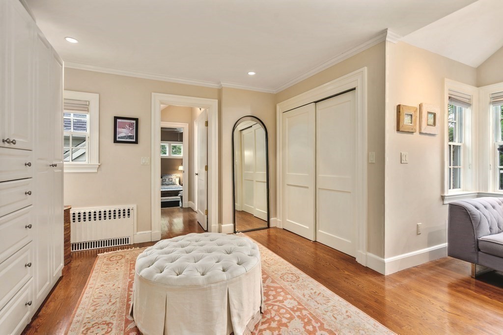 131 Oliver Road Newton, MA 02468 - Photo 24 of 41 a bedroom with a bed and a window