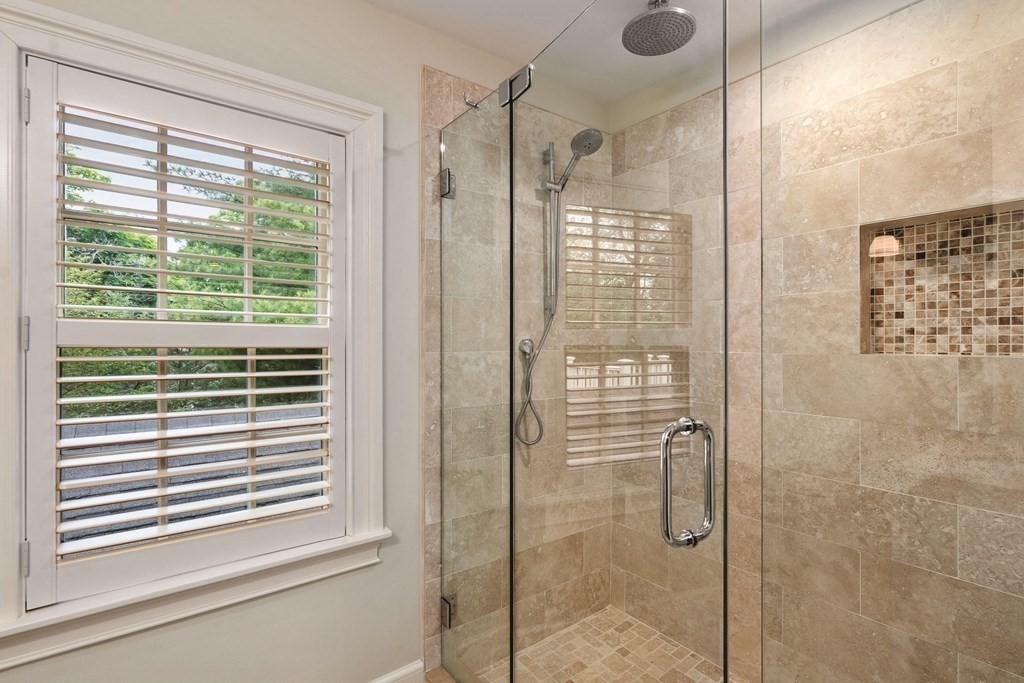 131 Oliver Road Newton, MA 02468 - Photo 27 of 41 a bathroom with a shower and a window
