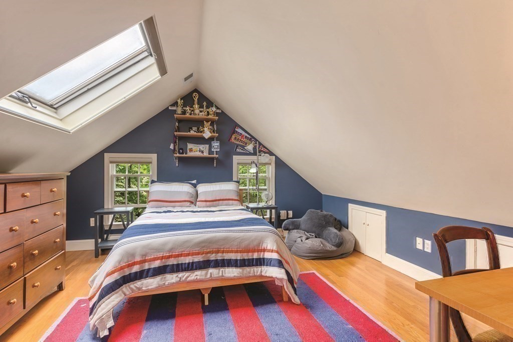 131 Oliver Road Newton, MA 02468 - Photo 31 of 41 a bedroom with bed and a dresser