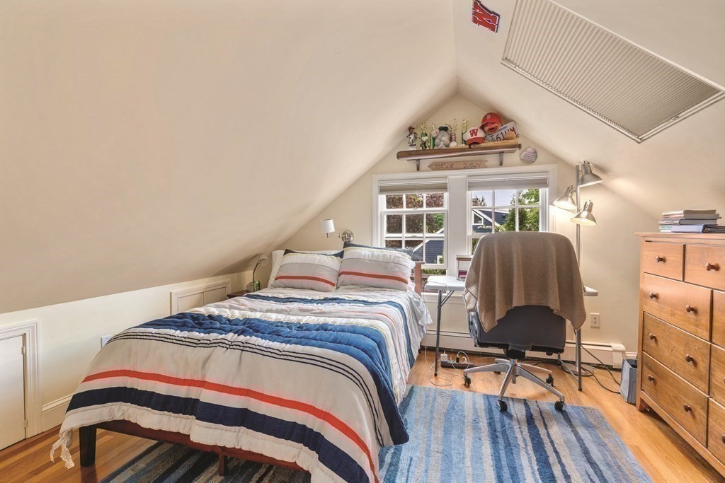 131 Oliver Road Newton, MA 02468 - Photo 32 of 41 a bedroom with a bed and a desk