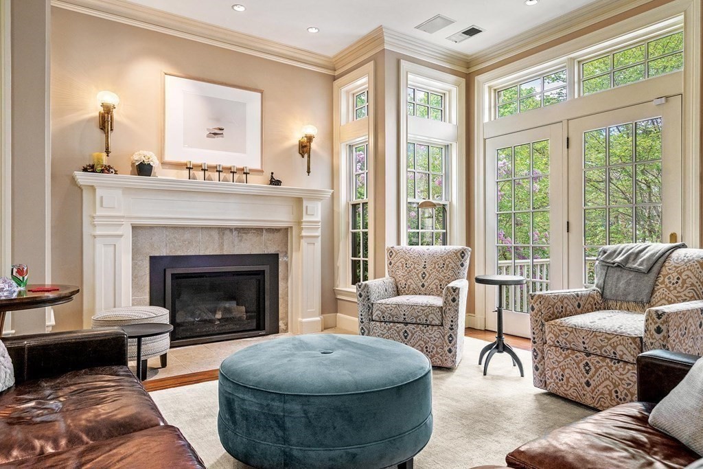 131 Oliver Road Newton, MA 02468 - Photo 4 of 41 a living room with furniture and a fireplace