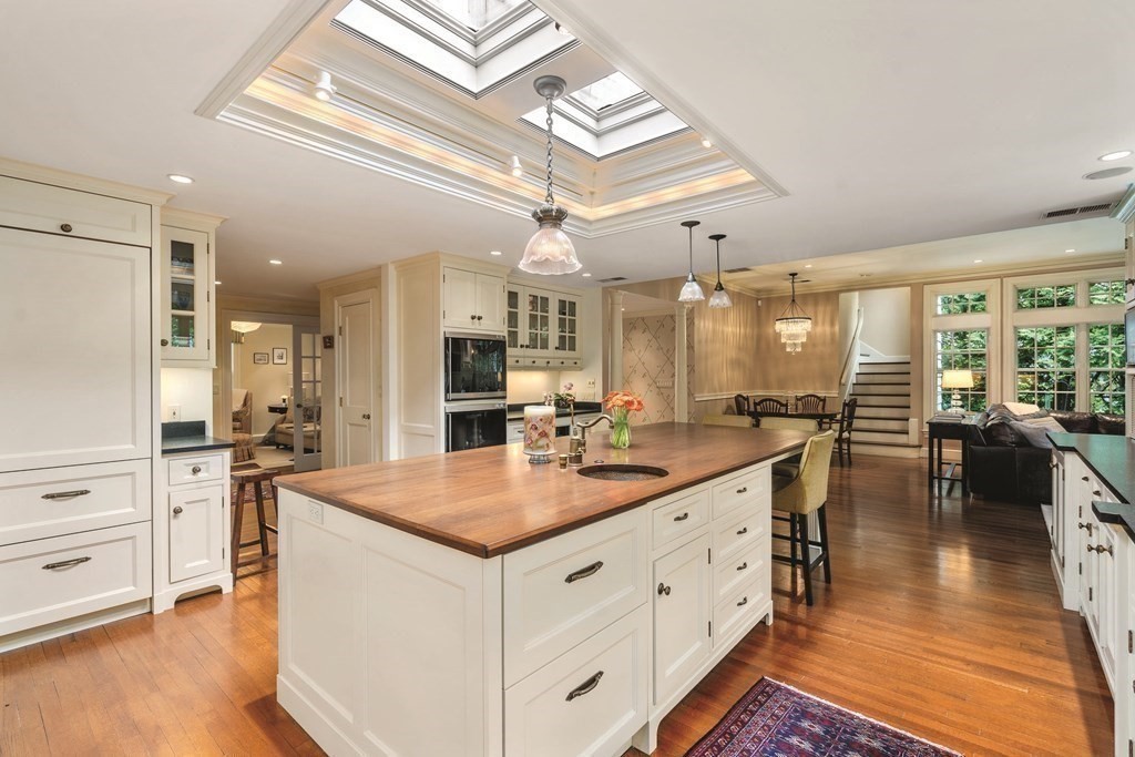131 Oliver Road Newton, MA 02468 - Photo 5 of 41 a kitchen with counter top space and wooden floor