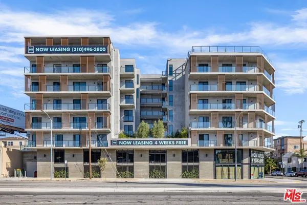 a front view of a multi story building