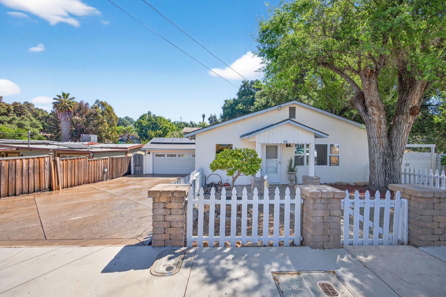 98 Mountain View Street Oak View, CA 93022 - Photo 1 of 42 a front view of a house having yard