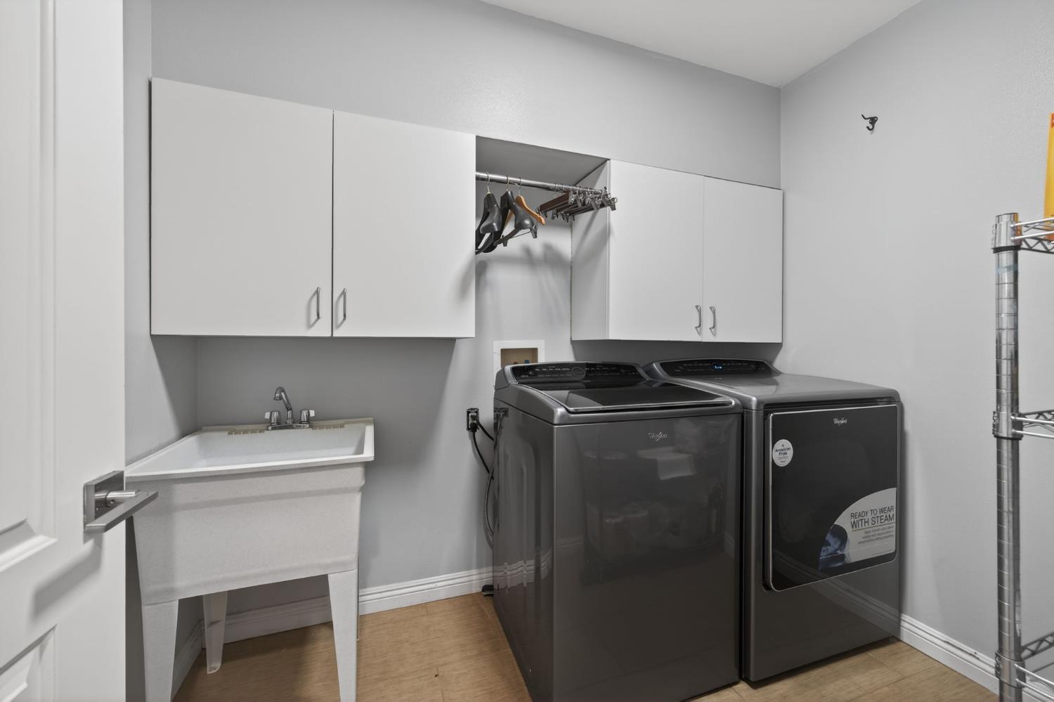 98 Mountain View Street Oak View, CA 93022 - Photo 20 of 42 a utility room with dryer and washer