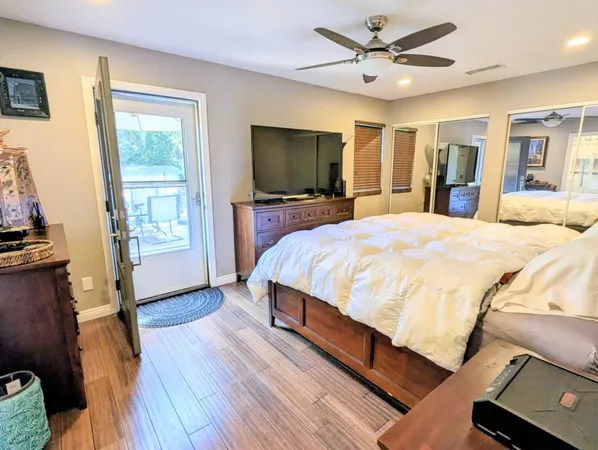 a view of a chair and tables in the garden