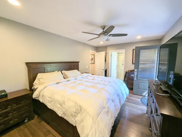 a living room with a washer and dryer