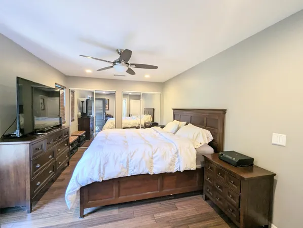 a view of a chair and tables in the patio