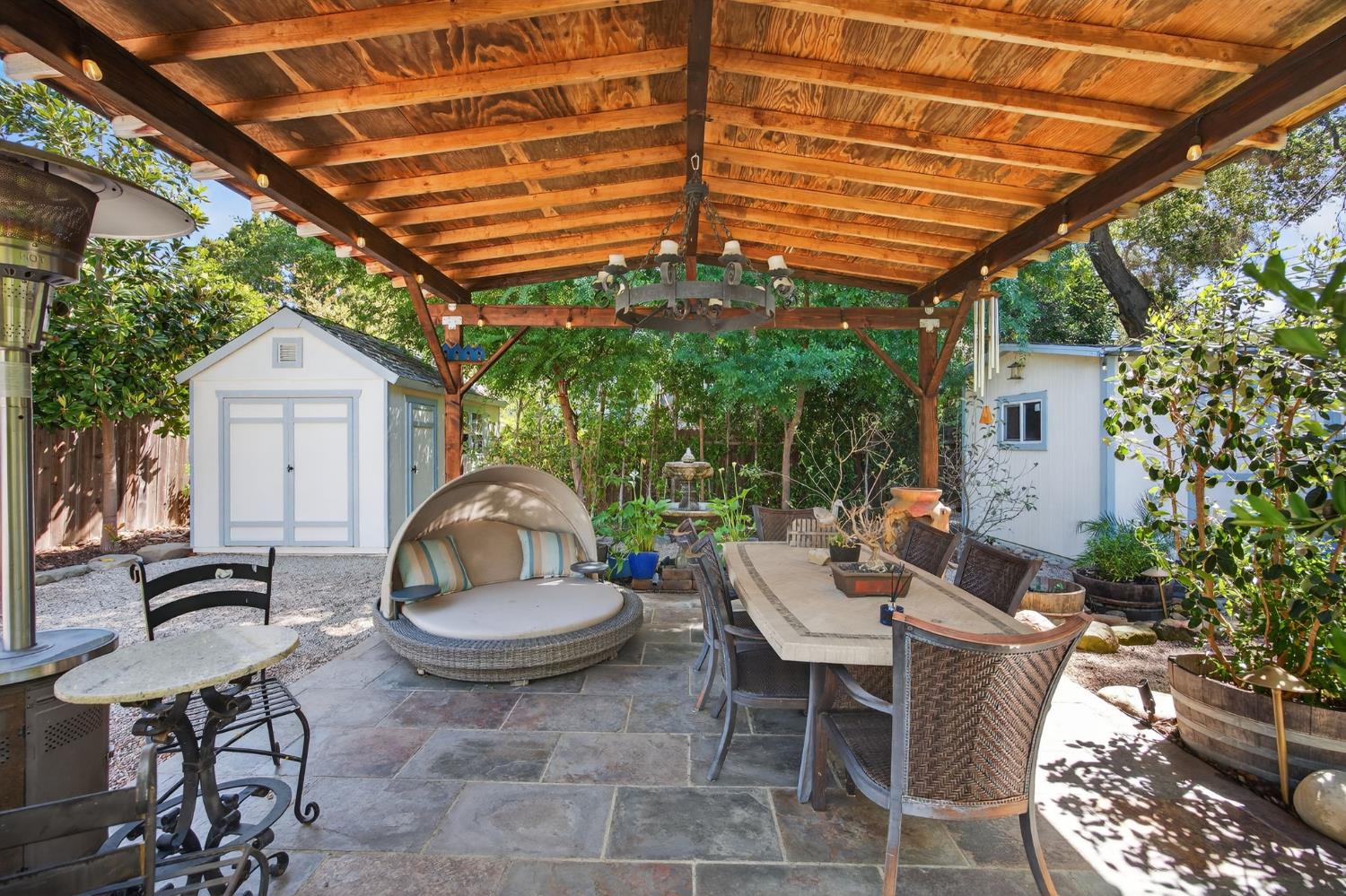 98 Mountain View Street Oak View, CA 93022 - Photo 29 of 42 a patio with a table and chairs and potted plants