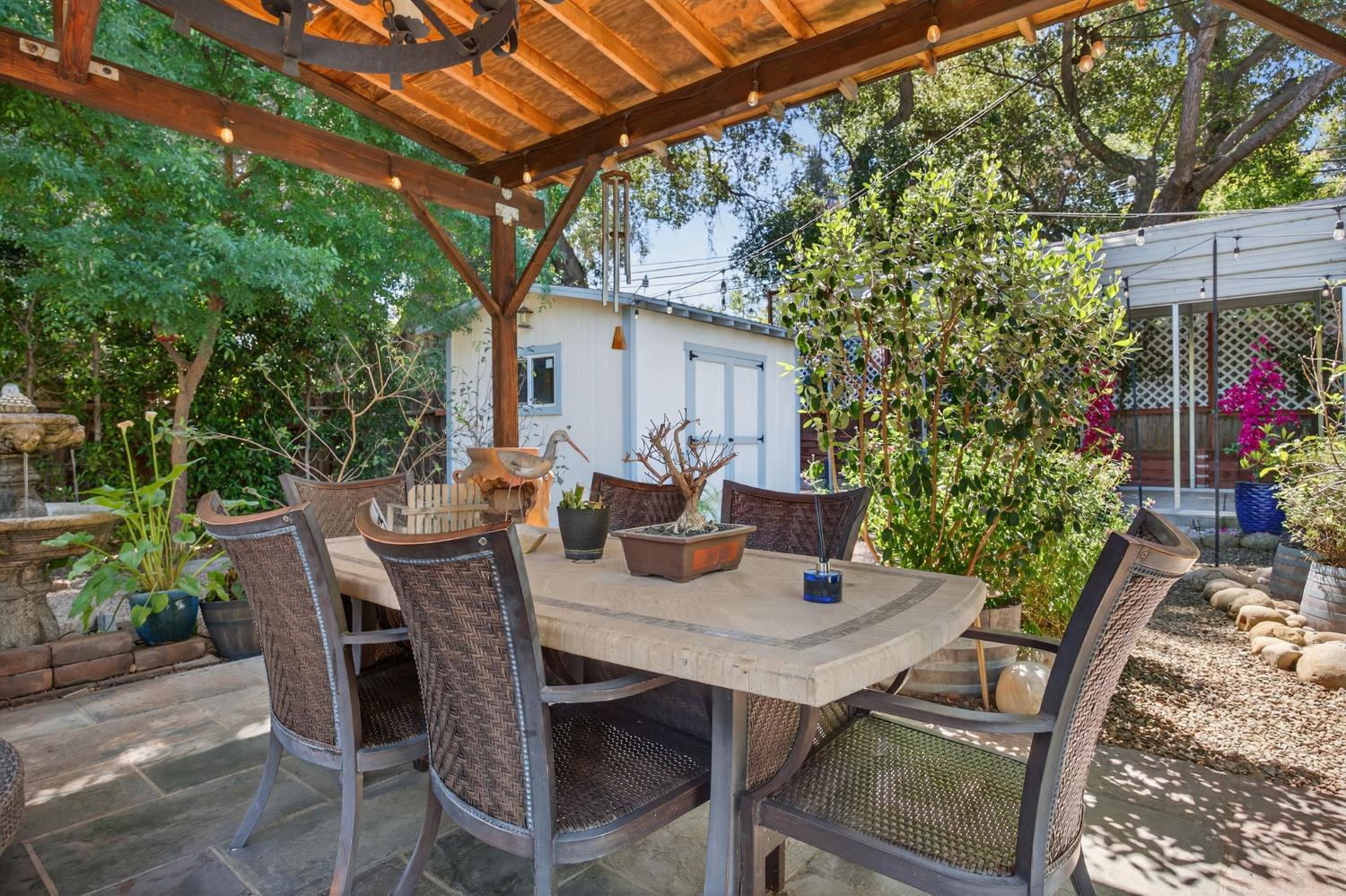 98 Mountain View Street Oak View, CA 93022 - Photo 30 of 42 a view of an outdoor space with a table and chairs