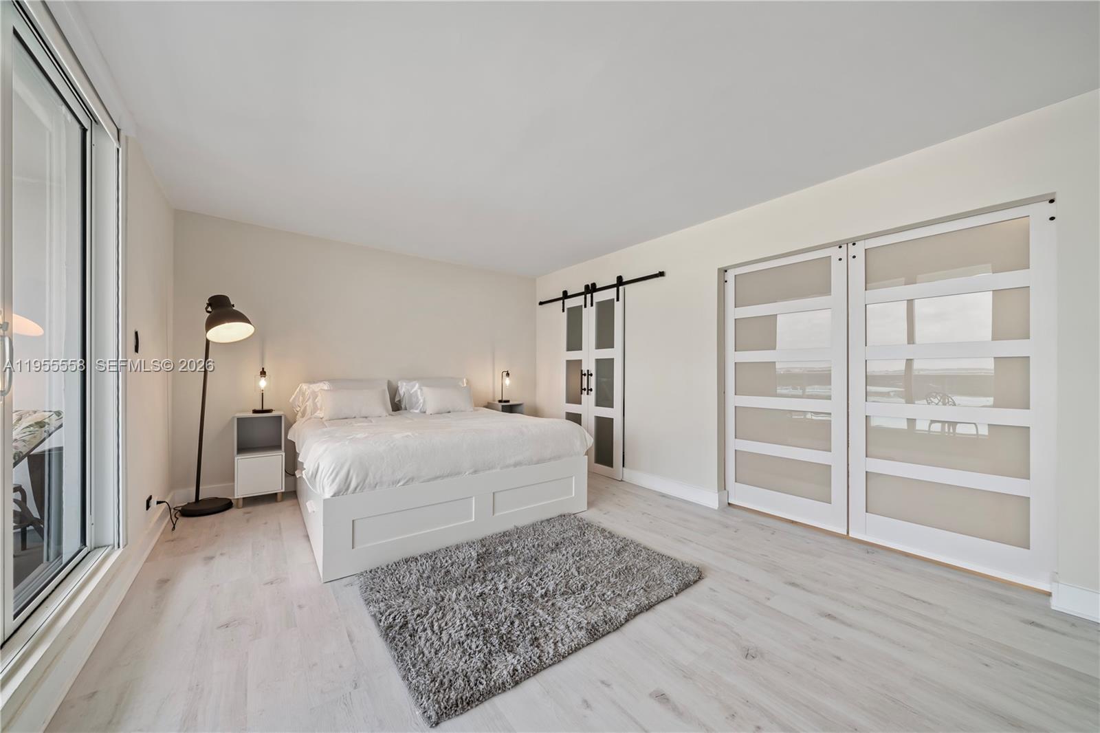 2301 Collins Avenue, Unit 1130 Miami Beach, FL 33139 - Photo 18 of 29 a room with a bed and a walk in closet