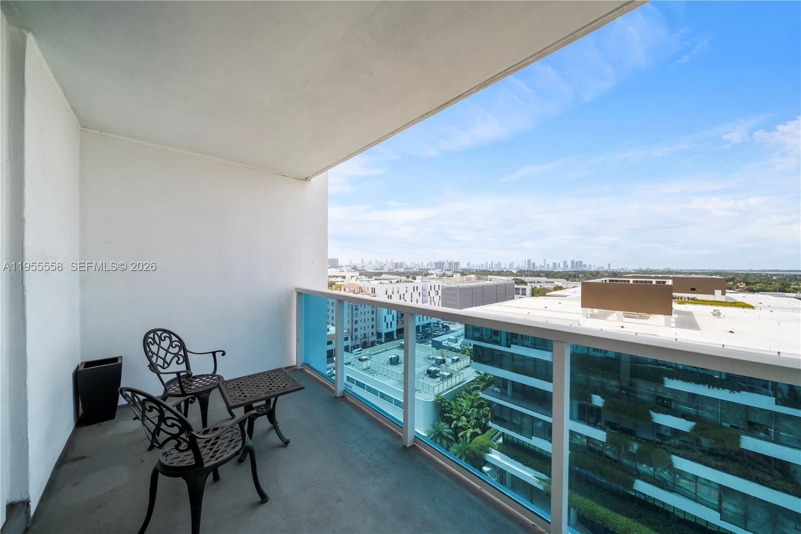 2301 Collins Avenue, Unit 1130 Miami Beach, FL 33139 - Photo 2 of 29 a view of a balcony with chairs