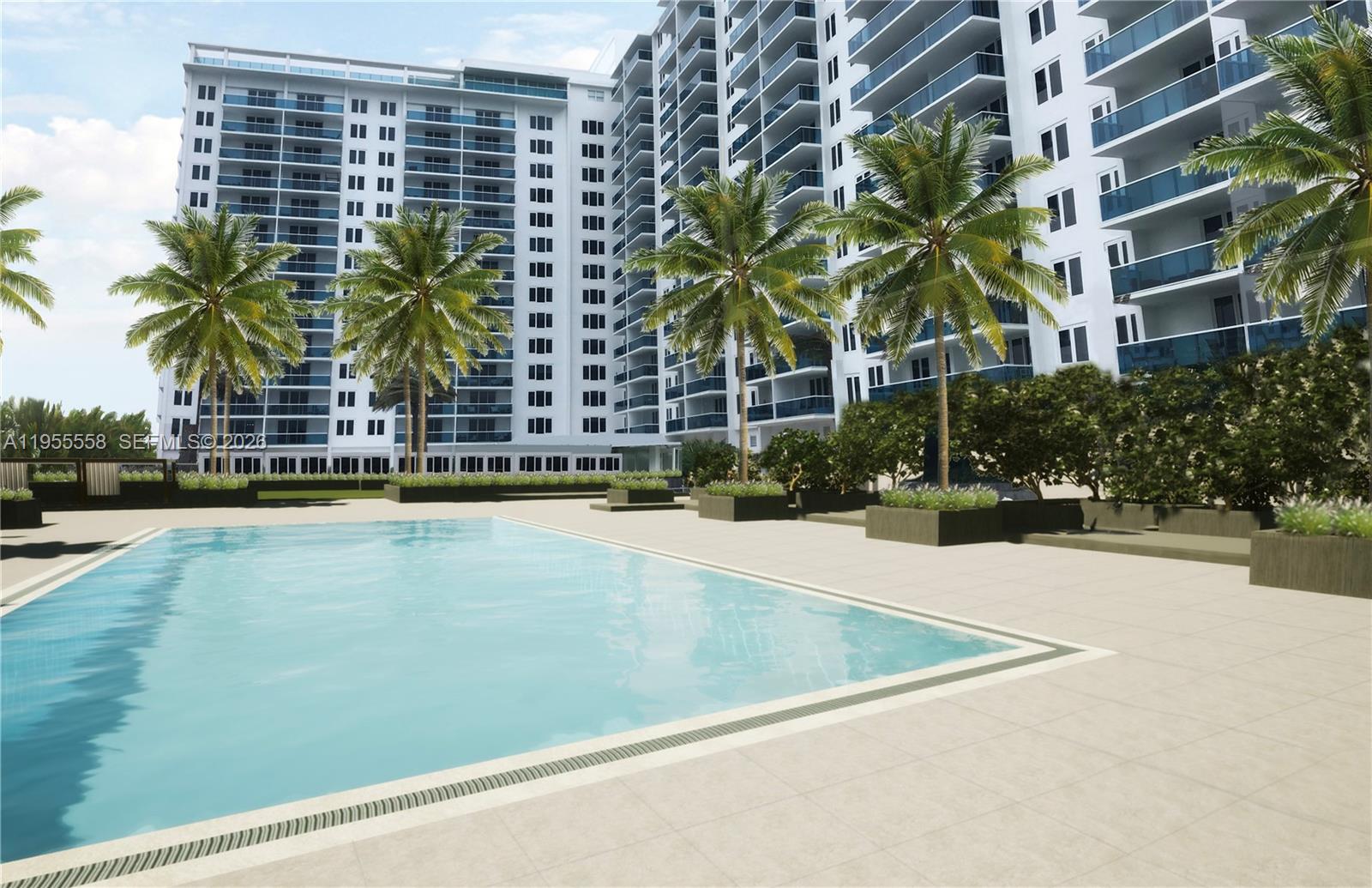 2301 Collins Avenue, Unit 1130 Miami Beach, FL 33139 - Photo 28 of 29 a view of a swimming pool with a lawn chairs and palm tree