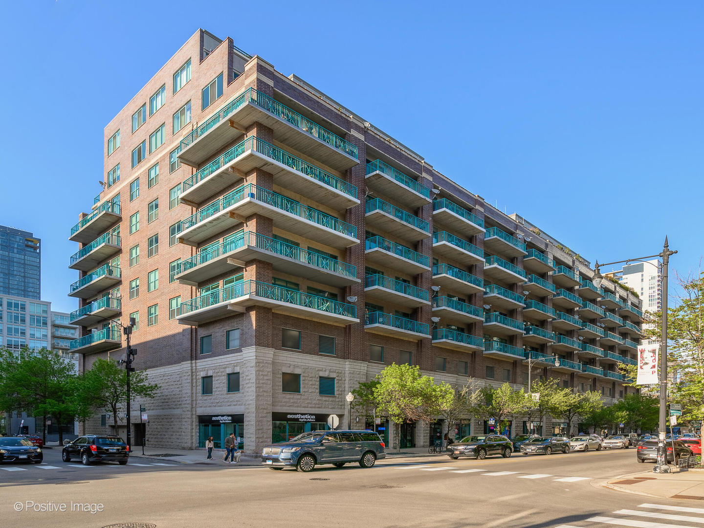 910 West Madison Street, Unit 509 Chicago, IL 60607 - Photo 1 of 14 a view of a tall building next to a road